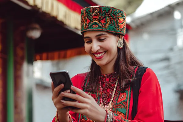 A person using their device against a moody casino-themed background, illustrating the smooth re-entry process at 88FD.